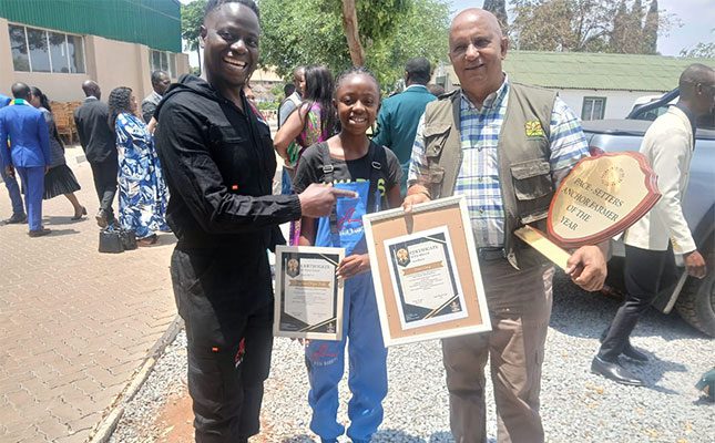 Tawanda-Bote-(left),-Tarylyn-Chipo-Bote-and-Craig-Irvine,-a-Zimbabwean-poultry-farmer